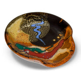 5 inch handmade pottery spoon rest in earth tone and red colors.  Hand made by Prairie Fire Pottery.  High-fired stoneware clay.  This is a 3/4 view of the product.