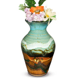 Turquoise-brown vase in a classic flared-neck design by Prairie Fire Pottery. Handmade pottery. Made in the U.S.A. View holding a bouquet of flowers.
