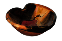 Heart-shaped bowl with red over toasted orange and black.  Handmade pottery.  Stoneware clay.  Hand made by Prairie Fire Pottery.  3/4 view.