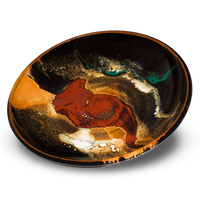 Beautiful colors on this 9-inch stoneware bowl from Prairie Fire Pottery.  Toasted orange and red over a deep, rich black.  Handmade pottery.  Hand made in stoneware clay and high-fired to 2400°.  Made in the U.S.A.