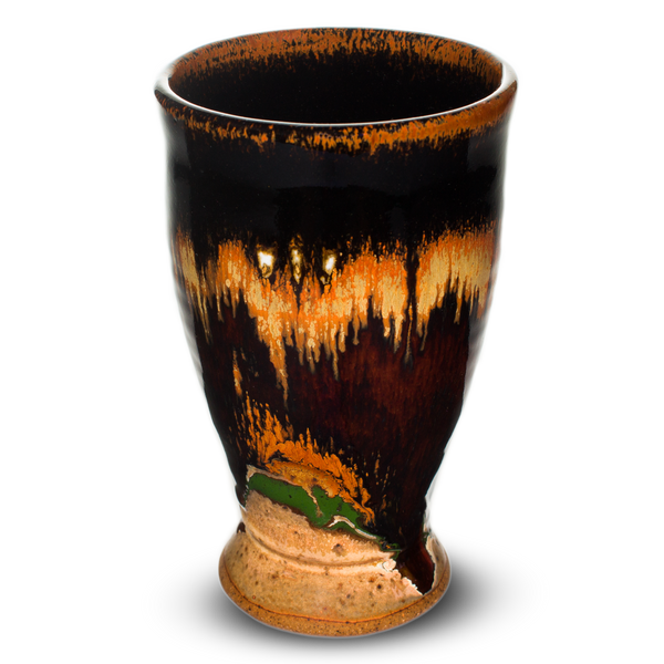 14 ounce handmade pottery cup in beautiful earth tone colors accented with red.  Hand made by Prairie Fire Pottery.