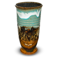 Slender 16oz. handmade pottery cup by Prairie Fire Pottery in pretty turquoise and brown colors.  Hand made in the U.S.A.