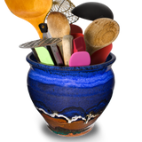 7 inch spoon crock in cobalt blue & brown . Hand made from stoneware clay. Handmade pottery by Prairie Fire Pottery.  View of cooking utensils inside the crock.