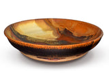 12 inch stoneware bowl in beautiful earth tone colors and red. Handmade pottery by Prairie Fire Pottery. Wheel-thrown and high=fired to 2400°. Made in the U.S.A.  This is the side view showing shape and depth.