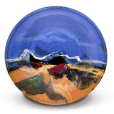 Large 13 inch stoneware bowl in cobalt blue and toasted orange colors, accented with red.  Handmade pottery by Prairie Fire Pottery.  This is an overhead view looking into the bowl.