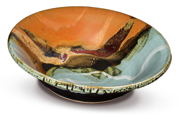 12 inch large handmade pottery bowl in turquoise and toasted brown colors.  Handmade in stoneware clay by Prairie Fire Pottery.  This is a 3/4 view of the bowl.