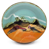 12 inch large handmade pottery bowl in turquoise and toasted brown colors.  Handmade in stoneware clay by Prairie Fire Pottery.  This is an overhead view of the bowl.