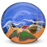 12 inch wheel-thrown pottery bowl in cobalt blue and toasted brown colors.  High-fired stoneware handmade by Prairie Fire Pottery.  This is an overhead view of the bowl.