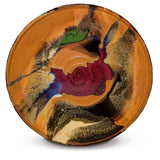 13 inch wheel-thrown stoneware bowl accented with vibrant red, green, and purple-blue colors.  Handmade pottery by Prairie Fire Pottery.  Overhead view.