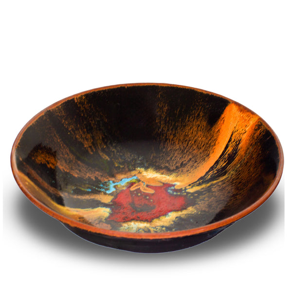 This is a beautiful  9 inch stoneware bowl in rich toasted brown and black colors accented with red.  Handmade pottery fired to 2400° by Prairie Fire Pottery.  This is a 3/4 view of the bowl.