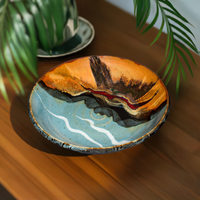 11 inch large stoneware bowl in an elegant home setting.  Handmade pottery by Prairie Fire Pottery.