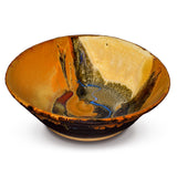 The earth tone colors are strikingly beautiful of this 10 inch stoneware bowl from Prairie Fire Pottery.  It is handmade from stoneware clay and kiln-fired to 2400°.  This is a 3/4 view of the bowl.