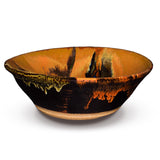 The earth tone colors are strikingly beautiful of this 10 inch stoneware bowl from Prairie Fire Pottery.  It is handmade from stoneware clay and kiln-fired to 2400°.  This is a side view of the bowl.