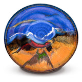 10 inch stoneware bowl from Prairie Fire Pottery.  It is wheel-thrown and high-fired to 2400 degrees.  It is glazed in beautiful cobalt blue over toasted brown  accented with ribbons of white and gold.  This the overhead view of the bowl.
