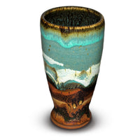 Tall 16oz. handmade pottery cup by Prairie Fire Pottery in pretty turquoise and brown colors.  Hand made in the U.S.A.