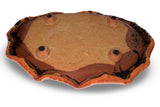 14 inch hand built stoneware plate in pretty earth tone colors and red. Handmade pottery by Prairie Fire Pottery. Kiln-fired to 2400°. Hand made in the U.S.A. This is a bottom view of the plate. 