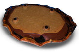 13 inch hand made stoneware platter in rich cobalt blue and toasted orange colors. Handmade pottery by Prairie Fire Pottery. This is a view of the bottom of this hand made platter.