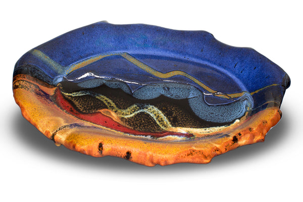13 inch hand made stoneware platter in rich cobalt blue and toasted orange colors.  Handmade pottery by Prairie Fire Pottery.  This is a view looking down into the platter.