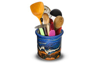 Handmade pottery spoon crock for holding kitchen utensils.  Rich colors of cobalt blue and toasted orange.  This view is the crock holding a selection of spoons.