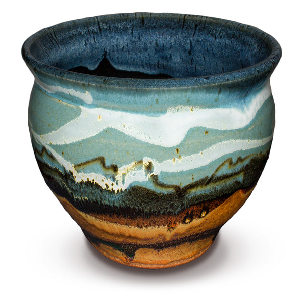 This is a large handmade Spoon Crock  or Utensil Holder for the kitchen glazed in pretty turquoise & toasted brown colors.  It has a large 7-inch diameter so it will hold plenty of kitchen tools.  It's handmade pottery by Prairie Fire Pottery. Dishwasher-safe.  Hand made in the U.S.A.