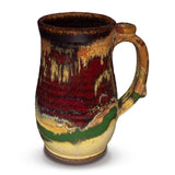Large 24 ounce tankard mug in earth tone and red glaze colors.  Handmade pottery by Prairie Fire Pottery.  This is the right side view.  Hand made and wheel-thrown in stoneware clay.