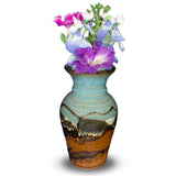 Turquoise-brown vase in a classic flared-neck design by Prairie Fire Pottery. Handmade pottery. Made in the U.S.A. View holding a bouquet of flowers.