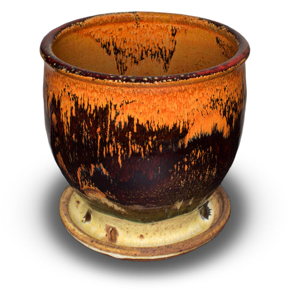 Small planter with a 5 inch diameter. Ideal for succulents. Glazed in beautiful toasted orange, black, and yellow. Handmade pottery by Prairie Fire Pottery. Hand made in the U.S.A.