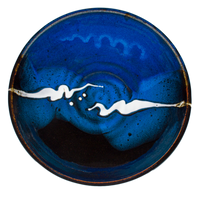 9 inch handmade pottery bowl in cobalt blue and black colors.  Hand made by Prairie Fire Pottery.  Overhead view.