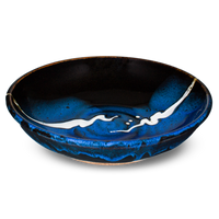9 inch handmade pottery bowl in cobalt blue and black colors.  Hand made by Prairie Fire Pottery.  3/4 view.
