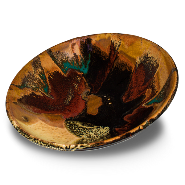 9 inch wheel-thrown bowl in beautiful earth tones and red.  Hand crafted in stoneware clay and high-fired to 2400°.  Handmade pottery by Prairie Fire Pottery.  3/4 view.