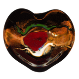 Heart-shaped bowl in toasted orange and black with red accents. Handmade pottery by Prairie Fire Pottery.  Overhead view.