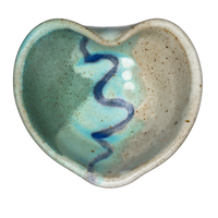 Handmade pottery Heart Bowl in turquoise & white with blue accent.  Overhead view.