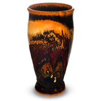This is Prairie Fire Pottery at its best.   Tall stoneware cup in gorgeous toasted brown and red colors.  Handmade pottery by Prairie Fire Pottery.  Hand made in the U.S.A. 