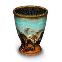 Pretty 8 ounce cup in turquoise-brown colors.  It's hand made and wheel-thrown in stoneware clay by Prairie Fire Pottery.  Handmade pottery made in the U.S.A.