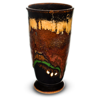 7 inch tall handmade pottery cup in brick red and soft brown colors over black.  Hand made by Prairie Fire Pottery in stoneware clay.