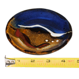 Cobalt blue and toasted brown colors on a 4 inch handmade pottery plate.  Hand made by Prairie Fire Pottery from stoneware clay.  View with a ruler.