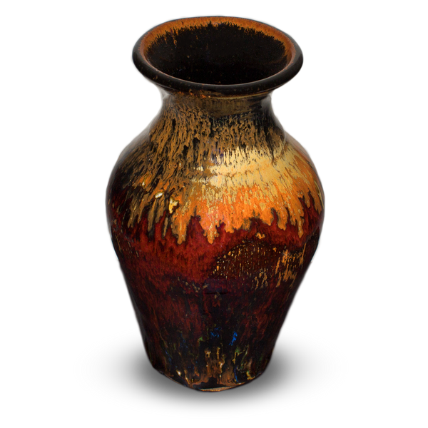 Beautiful red and yellow and toasted orange colors on this hand made vase.  It's handmade pottery by Prairie Fire Pottery.