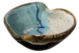 Turquoise and white Heart Bowl.  Handmade pottery.  Hand made by Prairie Fire Pottery in high-fired stoneware clay.  3/4 view.